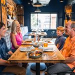 Family enjoys meal at Cabin Juice.